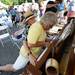 Musicians Mr. B and Bob Seeley play the piano in an unusual way during the Ann Arbor Street Art Fair, Friday, July 19, 2013. Melanie Maxwell | AnnArbor.com